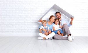 Family Staying Warm Under a Roof