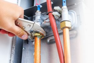 Technician Performing Oil Tank Repair Service